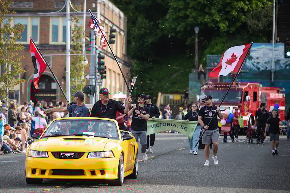 Black Ball Ferry Line representatives plus a delegation of tourism leaders from Victoria, lead the Port Angeles 4th of July parade.