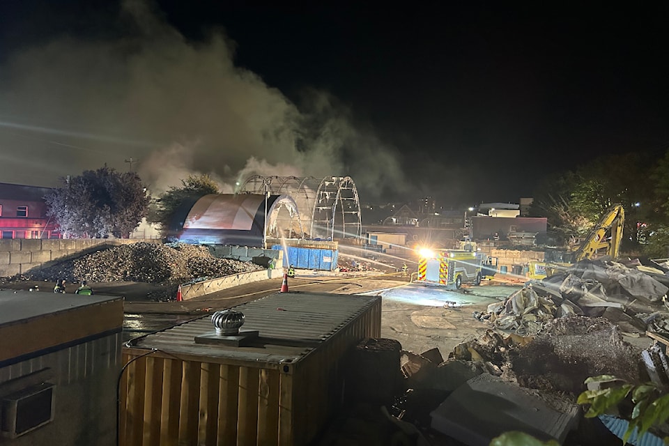 Crews fight a massive fire at a Victoria recycling centre shortly before 11 p.m. on July 21.