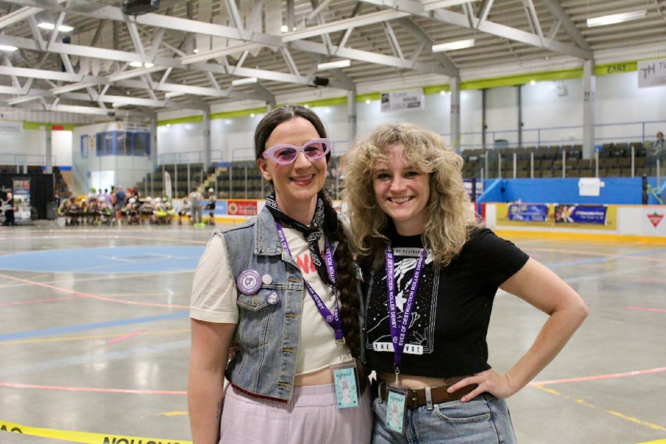 Quinn MacDonald (right) and Violet Criminal stand side by side at Capital City Chaos, reflecting on years of dedication to Victoria’s roller derby scene.