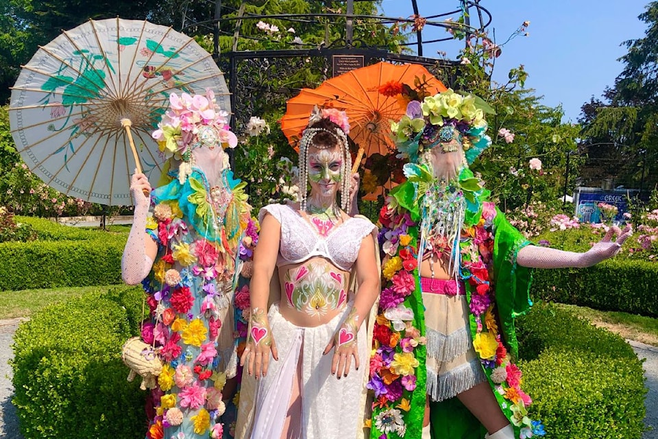 These festival goers don flowers in the gardens at the first ArtisTREE Festival in 2024.