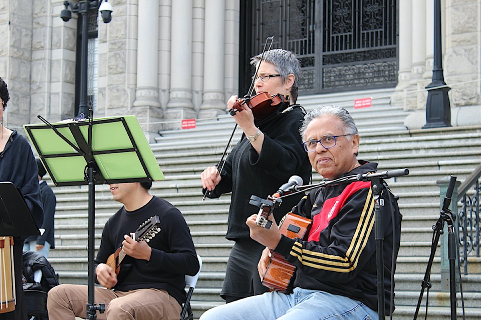 On the Legislature’s front steps, acts kept a crowd entertained. These included performances by Chinese dragon dancers and the Vancouver Island Peruvian Band.