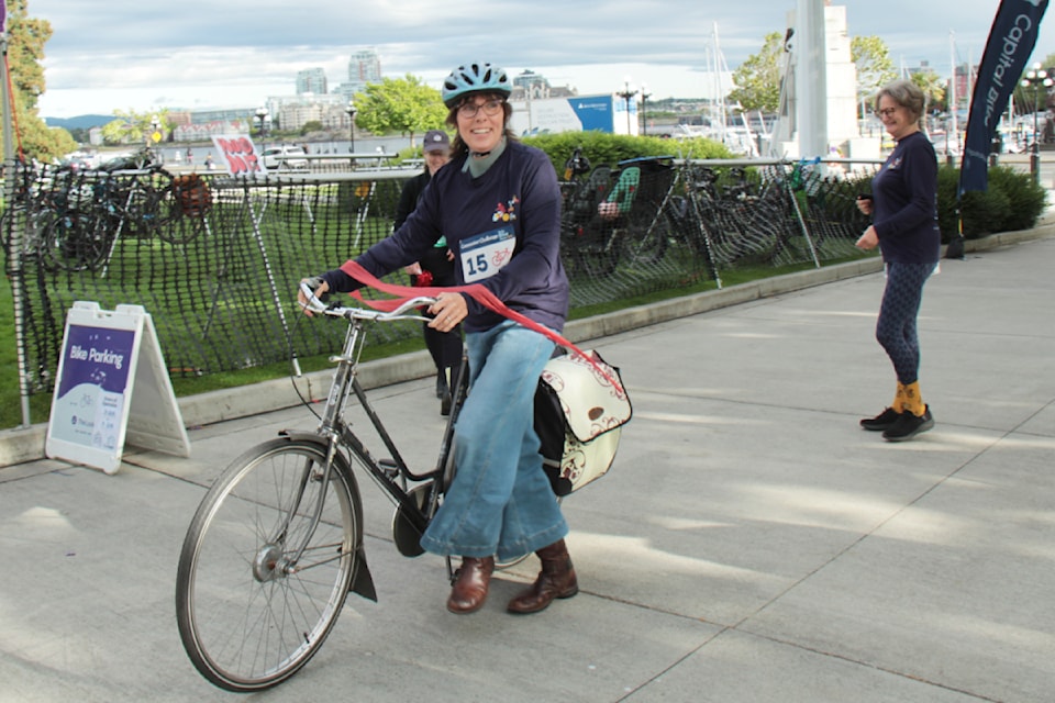 MLA Sonia Furstenau finishes well ahead of driving teammate Victoria Coun. Matt Dell in the commuter challenge hosted by Capital Bike that pits drivers against cyclists during the morning trip to downtown.