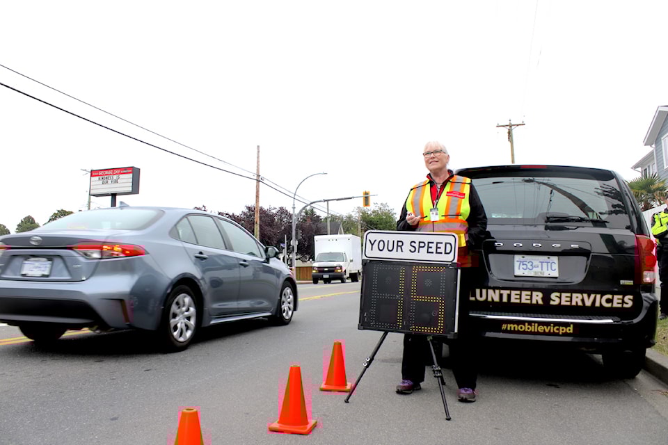 Speed watch volunteers like Wanda Lee Cameron joined Victoria police traffic officers outside George Jay Elementary School on Sept. 3 to remind drivers to slow down in school zones. 