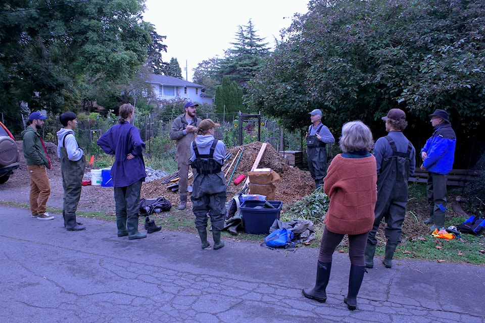 Biologist Austin Nolan from Peninsula Streams Society is shown here giving a briefing to the volunteers.