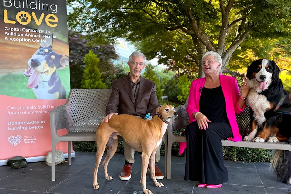 Victoria Humane Society executive director Penny Stone shares a light moment with donor Craig Mearns.