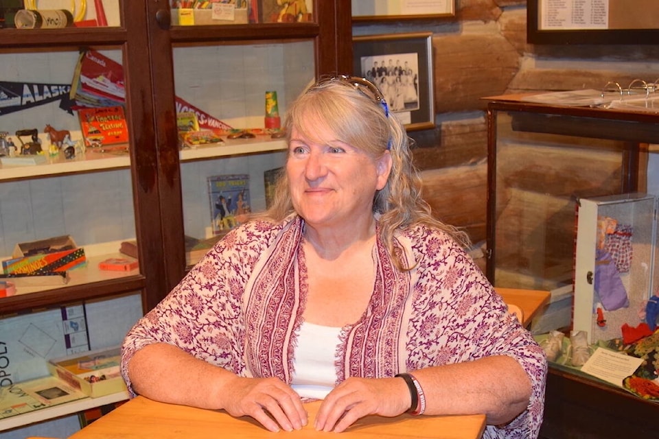 Saanich Pioneer Society communications director and board member Michele Sealey says there’s something fascinating to see everywhere you look in the Log Cabin Museum. (Brendan Mayer/News Staff) 