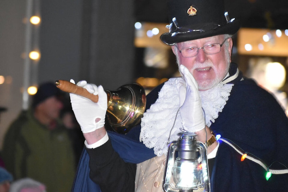 Sidney Town Crier Kenny Podmore near the head of a parade. (Wolf Depner/News Staff) 