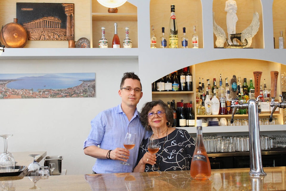Dimitri Adamopoulos and his mother Maria Adamopoulos are part of a family of restauranteurs who run Ithaka Greek Restaurant. (Samantha Duerksen/News Staff) 