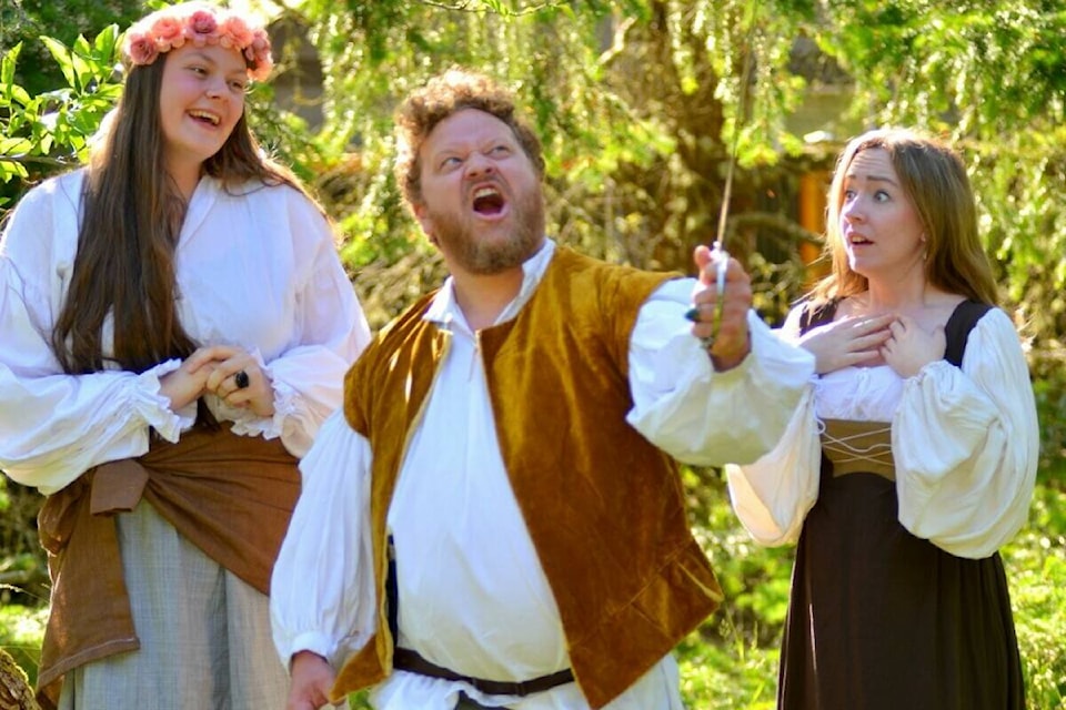 Diana (left) played by Jade Edgar, and heroine Helen played by Kimberley Chapman fawn over the soldier Bertram played by Will Johnson in Shakespeare’s comedy ‘All’s Well That Ends Well’ presented by the Shawnigan Players from Aug. 10 to 20 at Gem O’ The Isle farm. (Courtesy of Shawnigan Players) 