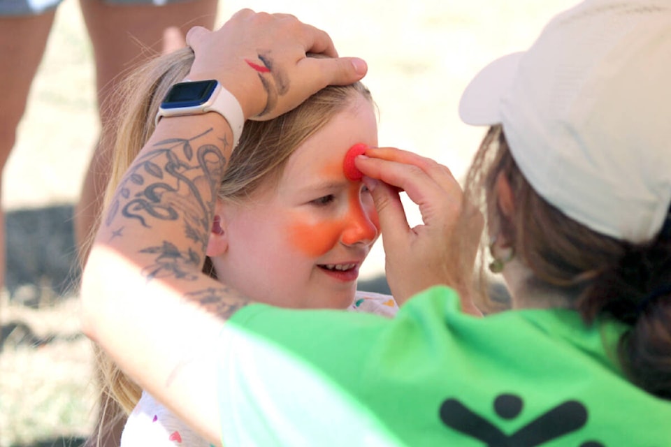 Hartley Don gets her face painted at Huddlestone Park Aug. 12 during Lantzville Minetown Day. (Karl Yu/News Bulletin) 