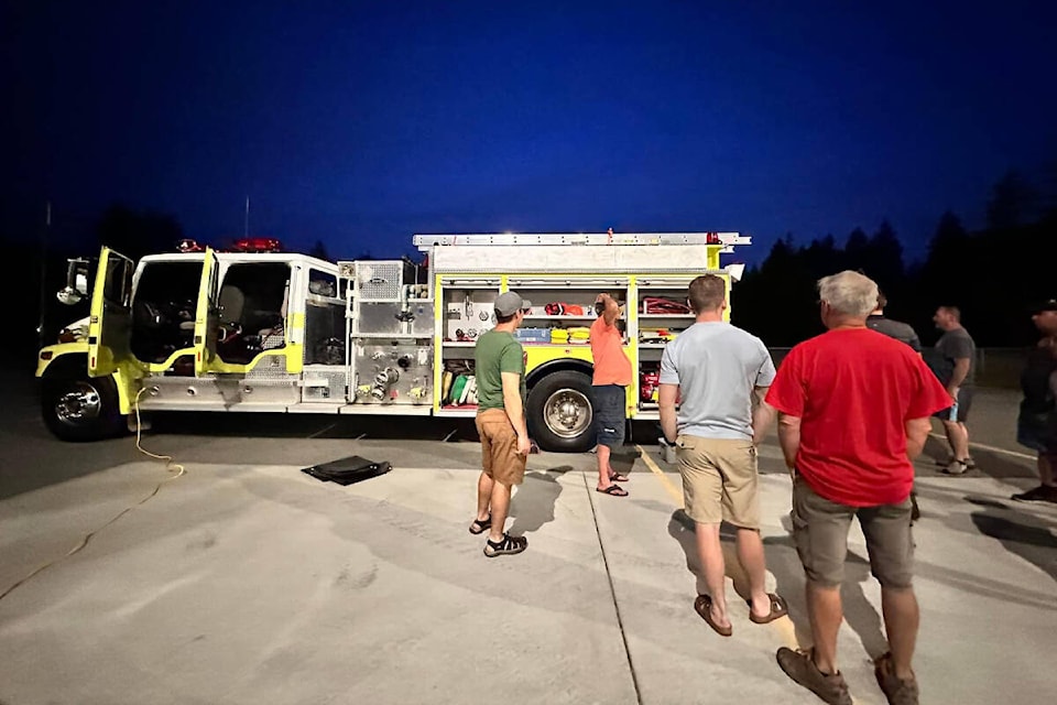 Beaver Creek VFD members ensure the department’s engine is packed for deployment to Kelowna. (BEAVER CREEK VFD PHOTO) 
