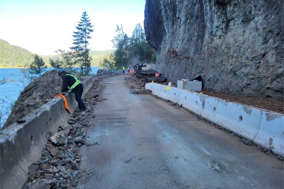 Large amounts of debris continue to be removed from the Cameron Bluffs area on Highway 4 between Port Alberni and Whiskey Creek after a wildfire burned right to the highway in June 2023. (B.C. MINISTRY OF TRANSPORTATION PHOTO) 