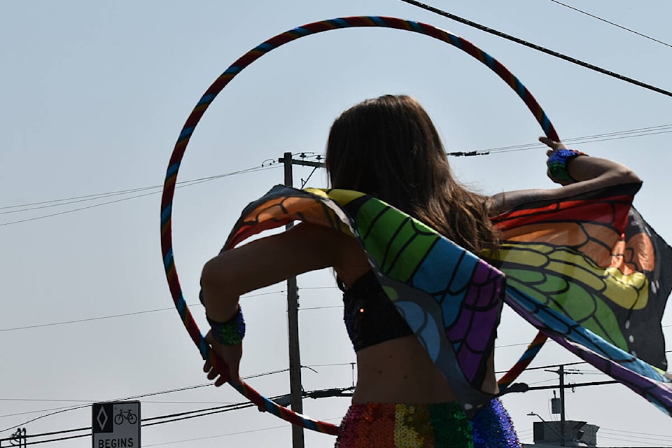 A parader is seen dancing down 5th Street in Courtenay’s first Pride parade. Saturday, Aug.26. (Connor McDowell/Comox Valley Record) 