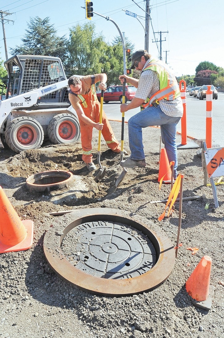 Manhole adjustment on North Dairy