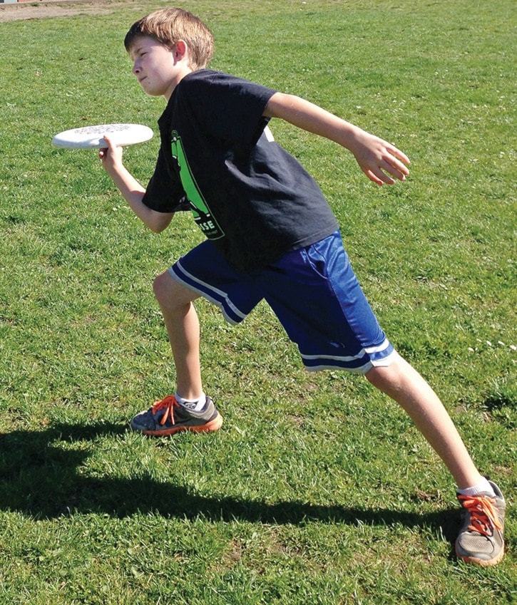 Max Pettenuzzo, 10, practises his Ultimate Frisbee skills at Willlows school.