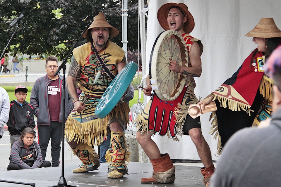 Git Hayetsk, representing the traditional dances of the Haida, Haisla, Tahltan, Tlingit, Lil’wat and Musqueam nations, perform outside the Royal B.C. Museum at the Victoria Aboriginal Cultural Festival on Sunday.
