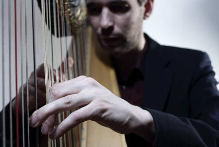 11331083_web1_copy_180411-OBN-Harpist1millionViews_1