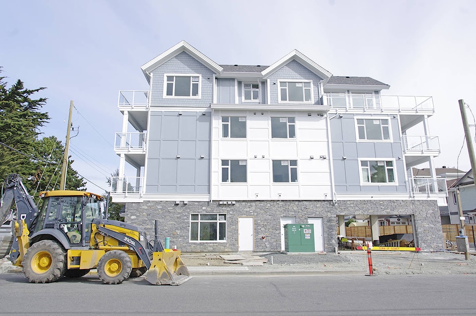 11526568_web1_180425-PNR-new-condos-sidney