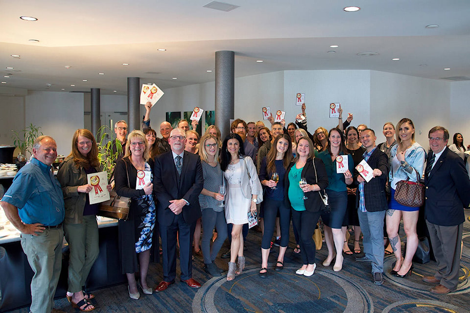 Best of the City 2018 winners hold up their awards. Nicole Crescenzi/VICTORIA NEWS