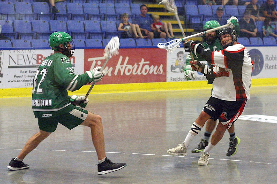 13053991_web1_180809-NBU-lacrosse-tmen-shamrocks-game4_1