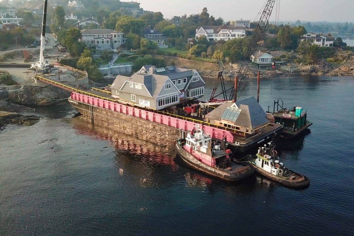 13261596_web1_180824-OBN-M-House-Move-to-Barge14