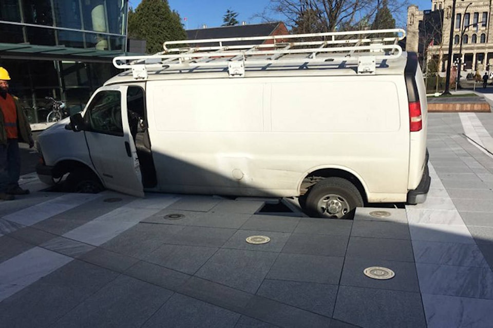 A van fell through tiles near a water feature at the construction site at 550 Michigan Ave. on Tuesday (Reddit/Barfsword)