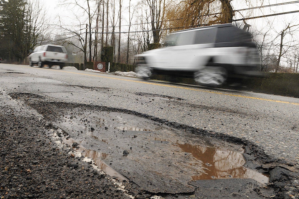 16357972_web1_potholes-on-Yale1.0119