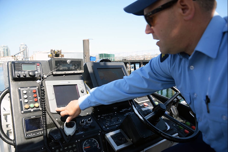 John Sartisohn, officer in charge of the Victoria Coast Guard search and rescue, shows the navigation tools and radio inside the station’s 47-foot motor lifeboat. The SAR team, launched under a year ago, will now have a permanent station at the Canadian Coast Guard base on Dallas Road and will be hiring over 100 new team members. (Nina Grossman/News Staff)