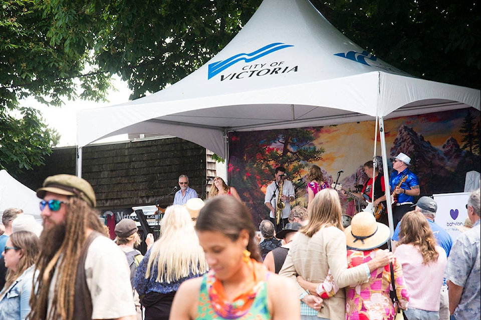 Hundreds enjoyed sunshine on Cook Street during the second annual Village Block Party that shut down the road from Oscar Street to Park Boulevard for a celebration of “all that is local.” (Nina Grossman/News Staff)