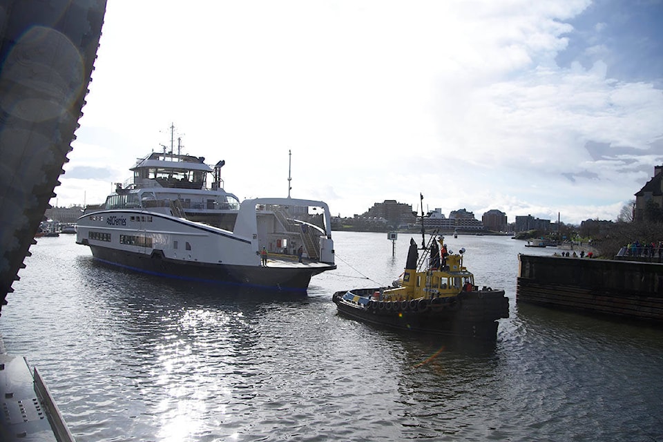 Tug boats pull in the second of two new hybrid vessels from BC Ferries. The vessels pulled into the Point Hope Shipyard after a two-month journey from Romania. (Nicole Crescenzi/News Staff)