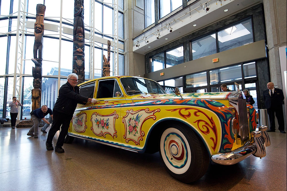 Jan. 27, 2020 – People carefully wheeled in John Lennon’s famous Rolls-Royce into the lobby of the Royal BC Museum. (Nicole Crescenzi/News Staff)