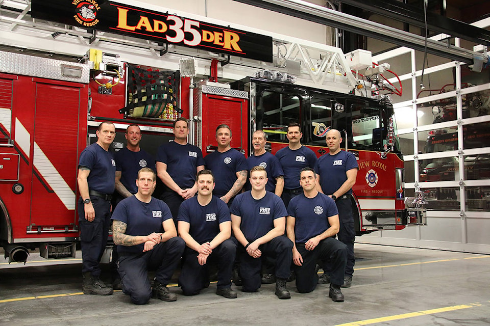 20334377_web1_200128-GNG-FirefightersClimbWall-groupshot_1