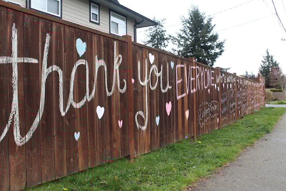 A fence on the corner of Hoffman Avenue and Winster Road has been painted to show thanks for essential service workers amidst the COVID-19 pandemic. (Shalu Mehta/News Staff)