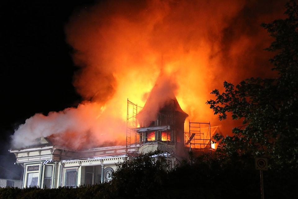 Victoria fire crews are working to put out a fire in the 200-block of Robert Street in Victoria West that started at around 8:40 p.m. on April 28. (Kendra Crighton/News Staff)