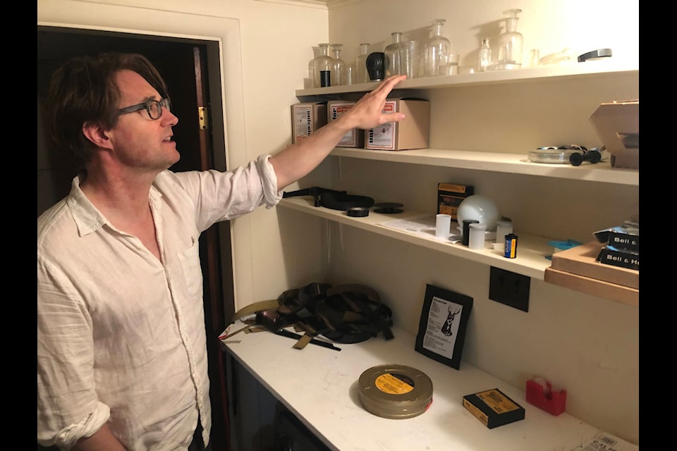 Documentary filmmaker Ramsey Fendall in the lab of his grandfather, the UVic biology professor Jeffree Cunningham, in South Oak Bay. (Travis Paterson/News Staff)