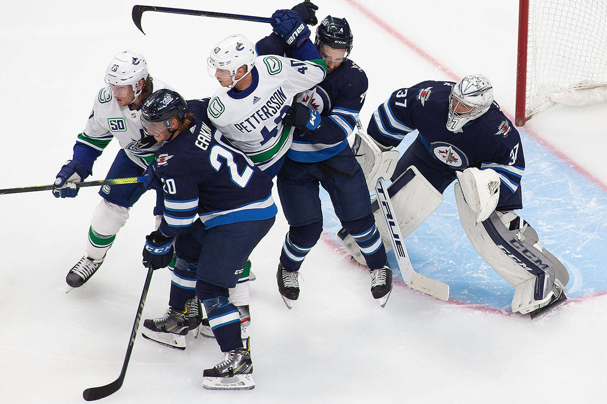 Hellebuyck backstops Jets to 4-1 win over Canucks in NHL exhibition play -  Greater Victoria News