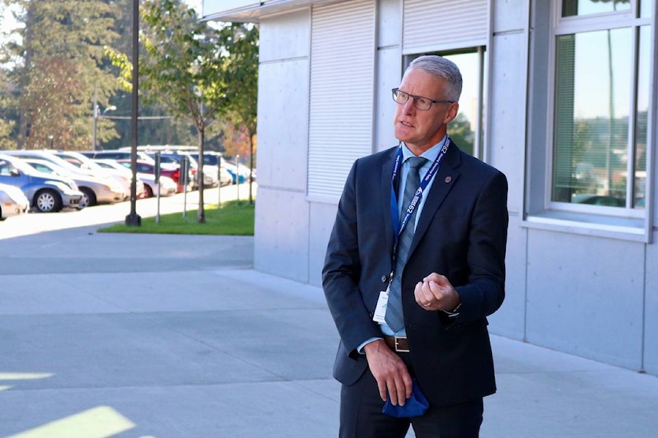 Sooke School District superintendent Scott Stinson explains most block classes at Belmont Secondary will be halved. (Aaron Guillen/News Staff)