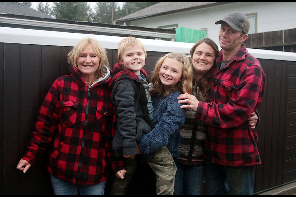 Lake Cowichan’s Oliver Finlayson, second from left, and his family — including grandma Marnie Mattice, sister Avery, mom Amie Mattice and dad Blair Finlayson — were all smiles on Nov. 16 when their pool arrived, thanks to lots of fundraising and the generosity of the Cowichan Lake community. (Kevin Rothbauer/Citizen)