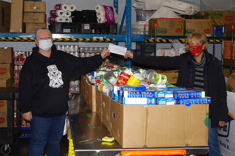 23540455_web1_201204-PNR--LegionFoodBankDonation-1_1