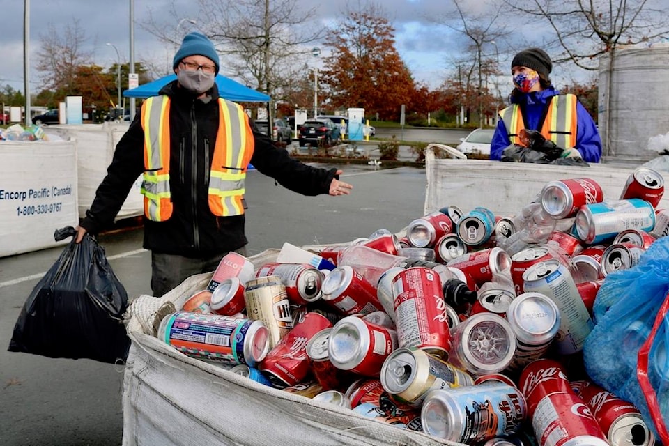 Jimmy Miller (left) and members of the WestShore Skatepark Coalition were at the Juan de Fuca Recreation Centre’s parking lot Sunday for a bottle drive to raise funds to build a skatepark on the West Shore. (Aaron Guillen/News Staff)