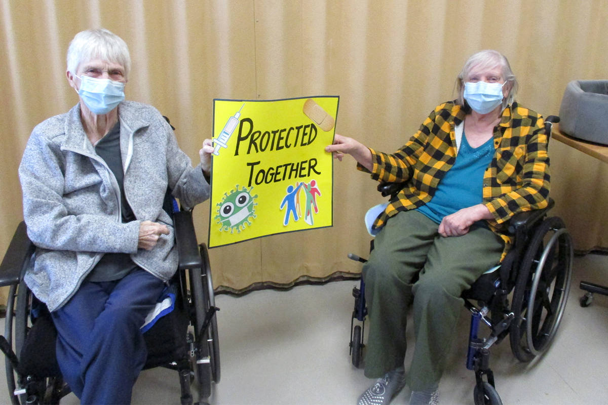 Cottonwoods Care Centre residents in Kelowna celebrate receiving their COVID-19 vaccinations. Photo: Interior Health