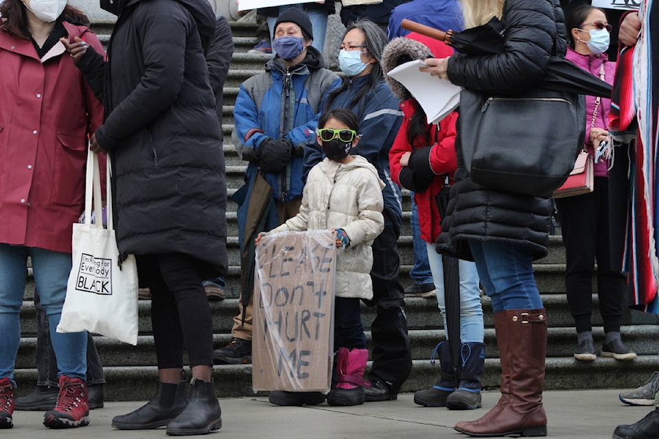 Demonstrators rally against anti-Asian racism during an event at the B.C. legislature on March 28. Jake Romphf/News Staff