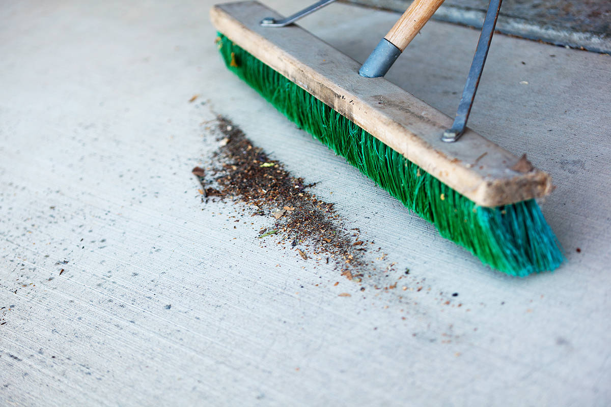 Use a broom instead of water to clean driveways and paths.