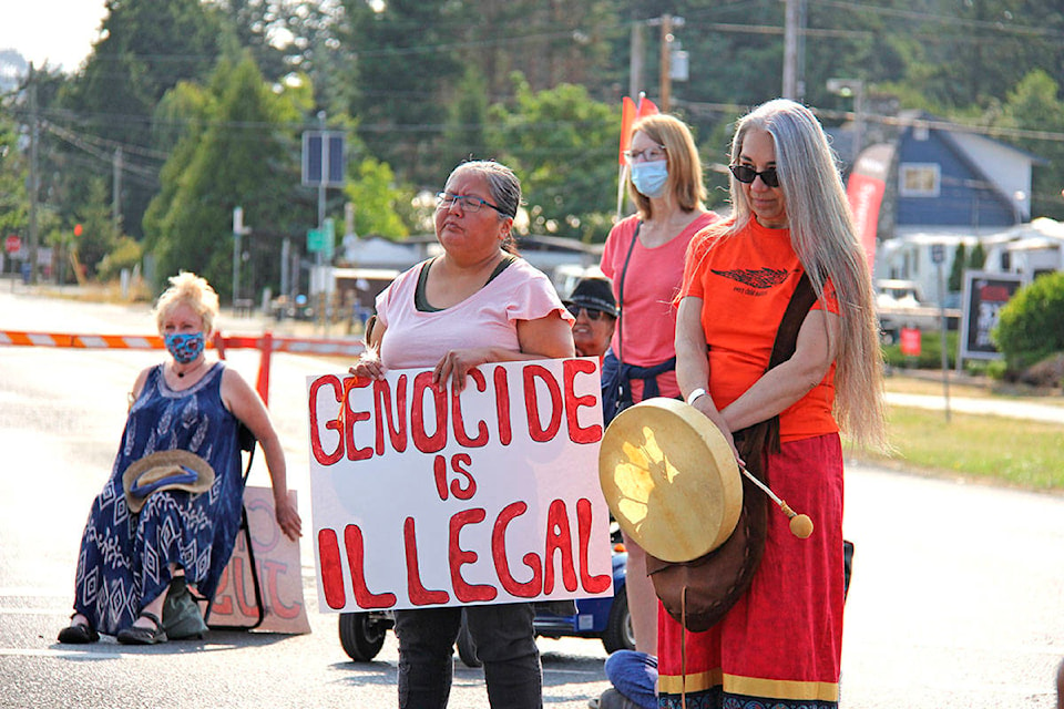 Over 100 Indigenous people and allies occupied a section of the Pat Bay Highway for an hour Aug. 2 to honour the children forced to go through the residential school system. (Jane Skrypnek/News Staff)
