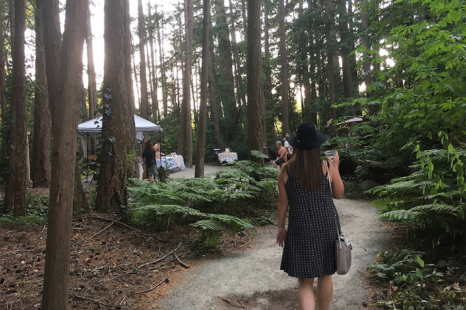 A woodsy backdrop sets the Local Folk Fair Summer Market at Sea Cider in Central Saanich apart from street markets. (Christine van Reeuwyk/News Staff)