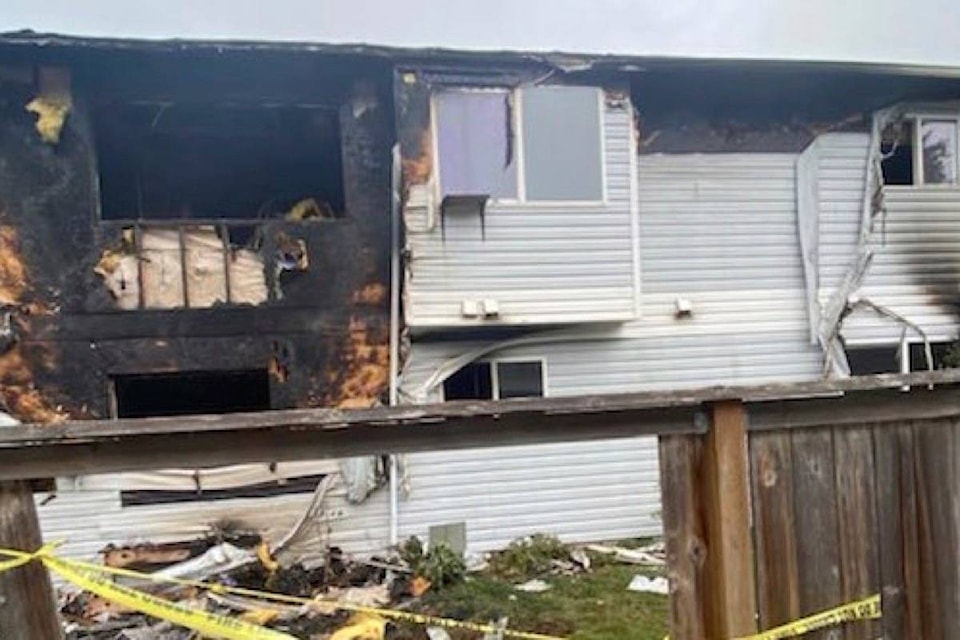 The aftermath of a fire at the Four Cedars townhouse complex on Dingwall Street that injured several, including a six-year-old boy. (Rebecca Benard photo)