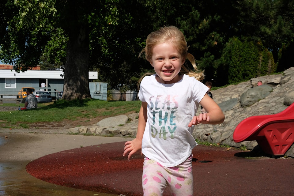 SEIZE THE DAY AND HAVE FUN
Rhiley Thorsen wasn’t dressed for the water park on Tuesday, but that didn’t stop the five-year-old from running through the spray at Centennial Park in Langford. (Zoe Ducklow/News Staff)