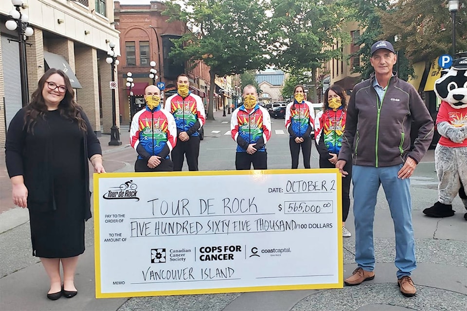 26276725_web1_201002-VNE-OakBayHIgh-TourDeRock-PRINT-FinalCheque_1