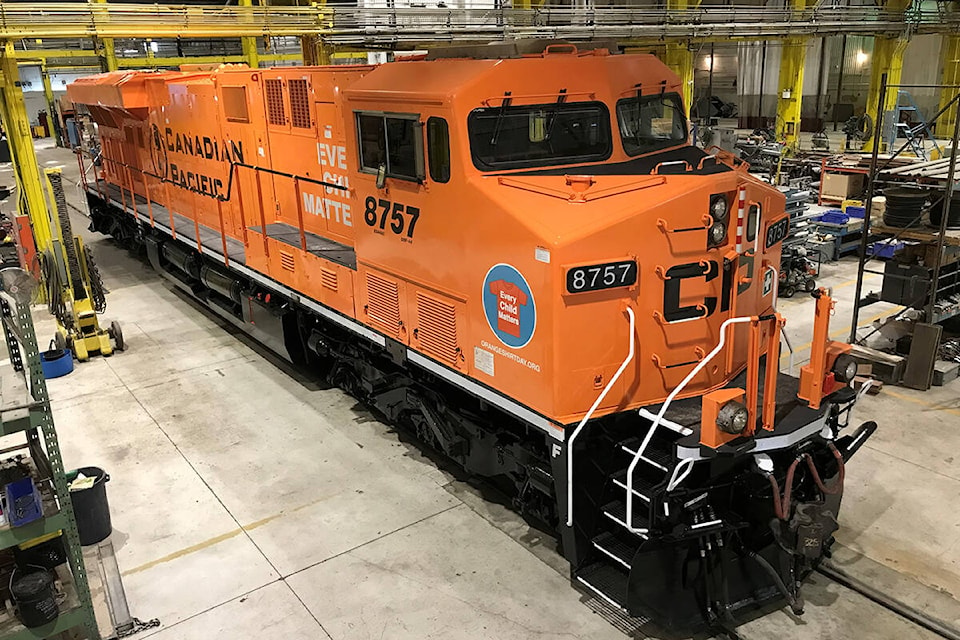 26646377_web1_210928-WLT-CP-OrangeShirt-Locomotive-_1