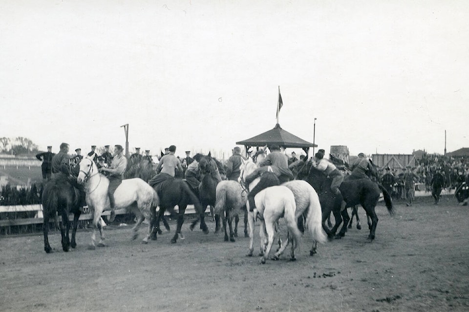 A photo by Frank Burrell shows military training exercises with horses at Willows Camp during the First World War. (Oak Bay Archives PHOT: 2005-020-001)
